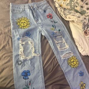 Embroidered Light Blue Jeans with Sun and Floral Design